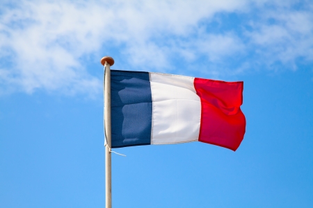 French flag in the blue skyの写真素材