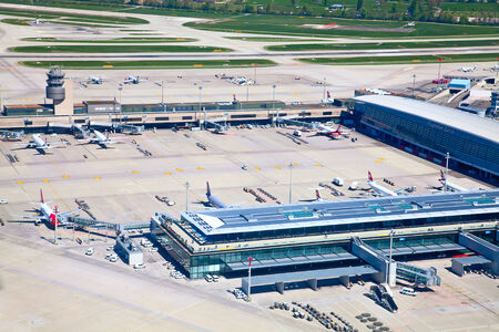 ZURICH - APRIL 17: Aircraft leaving Zurich airport on April 17, 2014 in Zurich, Switzerland. Zurich airport is home port for Swiss Air and one of the biggest european hubs.のeditorial素材