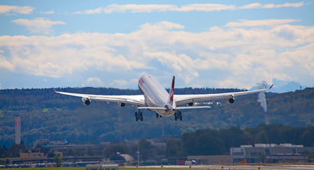 ZURICH - SEPTEMBER 21:Swiss airlines Airbus A340 taking off on September 21, 2014 in Zurich,...