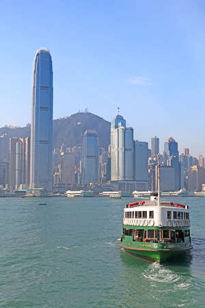 HONG KONG - DECEMBER 3: Ferry "Solar star" leaving Kowloon pier on December 3, 2010 in Hong Kong, China. Hong Kong ferry is in operation for more than 120 years and is one of tourist attractions of the city.のeditorial素材