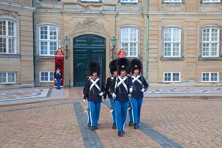 COPENHAGEN, DENMARK - AUGUST 25: unidentified soldiers of the Royal Guard in Amalienborg Castle by changing the guards on August 25, 2010 in Copenhagen, Denmarkのeditorial素材