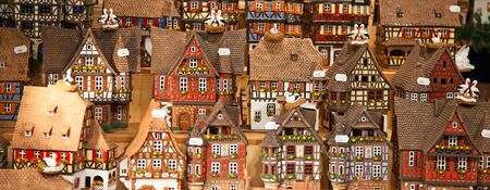 Traditional alsatian houses on the Christmas marketの写真素材