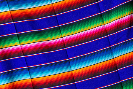 Traditional mexican bright stripped fabric on the market