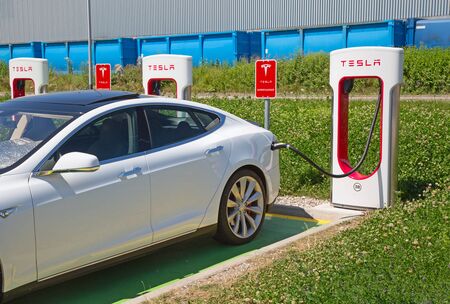 ZURICH - July 30:  Tesla Supercharger station on July 30, 2016 in Zurich, Switzerland. Tesla motors develops network of the charging stations across Europe and World.のeditorial素材
