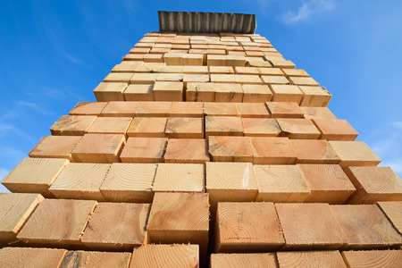 Stack of new wooden studs at the lumber yard