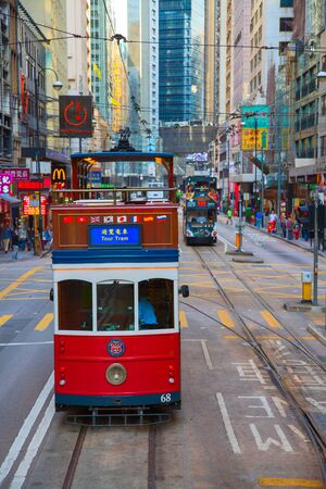 HONG KONG - APRIL 02: Unidentified people using tram in Hong Kong on April 02, 2017. Hong Kong tram is the only in the world run with double deckers and one of the main tourist attractions.のeditorial素材