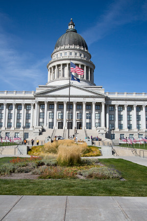 Salt Lake City, Utah, USA - October 8, 2016. Facade of the Utah State Capitol decorated with national flags.のeditorial素材