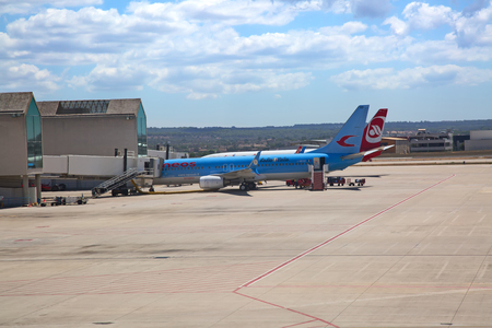 PALMA DE MALLORCA - August 14:  Planes preparing for take off at Palma de Mallorca Airport on August 14, 2017 in Palma, Spain. Palma airport is major hub for tourists coming to the islandのeditorial素材