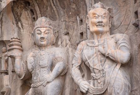 Famous Longmen Grottoes (statues of Buddha and Bodhisattvas carved in the monolith rock near Luoyang in Hennn province, China)のeditorial素材