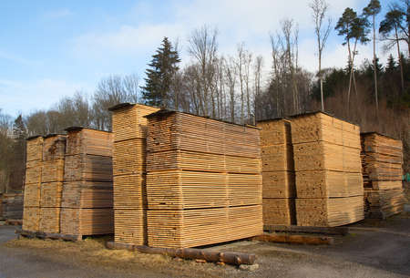 Stack of new wooden studs at the lumber yardの写真素材