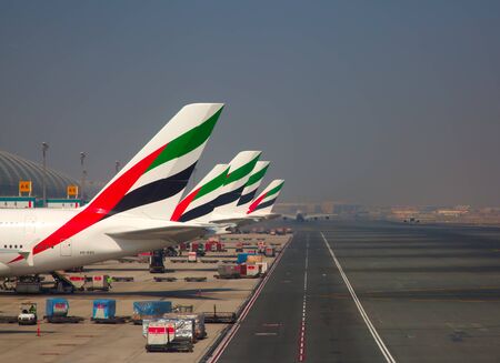 Dubai - September 29:  Planes preparing for take off at Dubai Airport on September 29, 2017 in Dubai, U.A.E. Dubai airport is home port for Emirates Airlines and one of the biggest world hubs.のeditorial素材