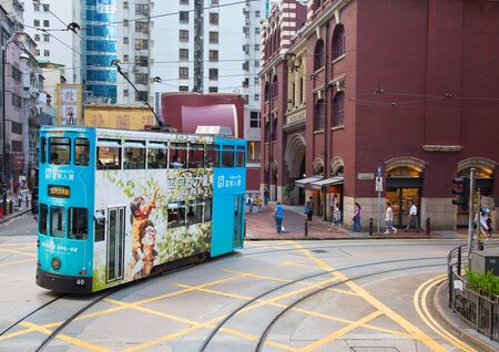 HONG KONG - APRIL 02: Unidentified people using tram in Hong Kong on April 02, 2017. Hong Kong tram is the only in the world run with double deckers and one of the main tourist attractions.のeditorial素材