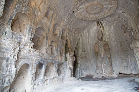 Famous Longmen Grottoes (statues of Buddha and Bodhisattvas carved in the monolith rock near Luoyang in Hennn province, China)の写真素材
