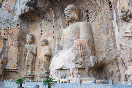 Famous Longmen Grottoes (statues of Buddha and Bodhisattvas carved in the monolith rock near Luoyang in Hennn province, China)の写真素材
