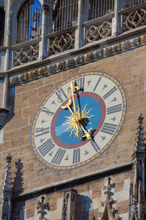 Main square of the Munich, Germany - Marienplatz (Marian square). The old and new city halls, Marian column, Church and Fish's fountain together are forming unique architectural style of the squareのeditorial素材