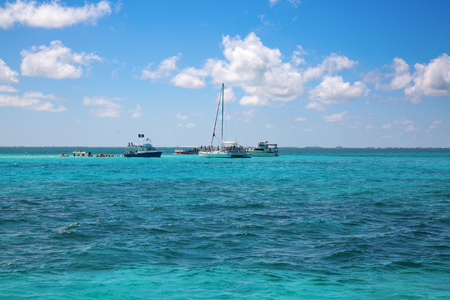 GEORGE TOWN - February 16: Unidentified people visiting Stingray city on Gran Cayman on February 16, 2019 in George town, Cayman islands. Stigray city is famous snokerling spot visited on cruise in Caribbean sea.のeditorial素材
