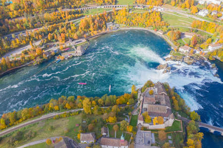 Rheinfall - the biggest waterfall in Europe. Aerial view over autumn landscape.のeditorial素材