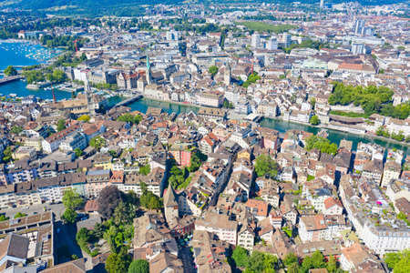 Aerial view of Limmat river and famous Zurich churches. Zurich is important financial center of Switzerland and lovely historical city.のeditorial素材