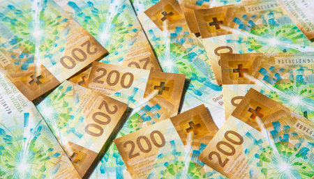Collection of the Swiss 1000 franks banknotes. 1000 franks note issued by Swiss National Bank (SNB) is one of the most valueable banknotes in the world. The current 1000 franks banknotes are in circulation in Switzerland since 1995.の写真素材