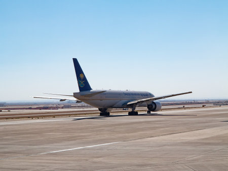 Riyadh - March 01:  Planes preparing for take off at Riyadh King Khalid Airport on March 01, 2016 in Riyadh, Saudi Arabia. Riyadh airport is home port for Saudi Arabian Airlines.のeditorial素材