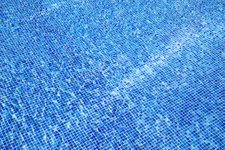 beautiful clear pool water reflecting in the sun