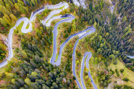 Winding road of the Maloja pass connecting Switzerland and Italyの写真素材