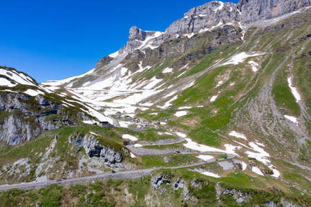 Klausenpass - mountain road connecting cantons Uri and Glarus in swiss alpsの写真素材