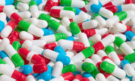Collection of the colorful capsules with medicinesの写真素材