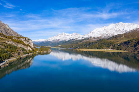 Winding road of the Maloja pass connecting Switzerland and Italyの写真素材