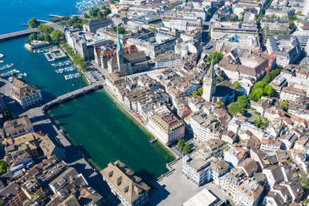 Aerial view of Limmat river and famous Zurich churches. Zurich is important financial center of Switzerland and lovely historical city.の写真素材