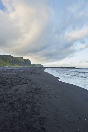 ocean seascape south iceland, basalt stacks, vik i myrdal