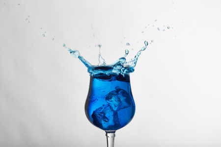 Water splash with ice cubeの写真素材