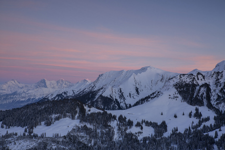 winter sunset swiss alps, gurnigel, bernese oberlandの写真素材