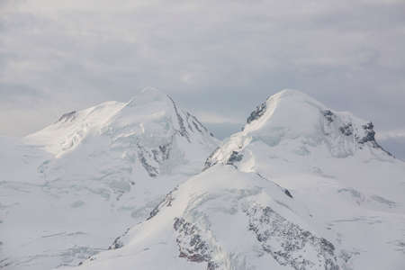 Sunrise and alpine glow over Matterhorn Region Zermatt in Switzerland viewed from Gornergrat