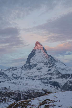Sunrise and alpine glow over Matterhorn Region Zermatt in Switzerland viewed from Gornergratの写真素材