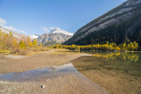 Lake Derborence area Valais in autumn. Indian summer. Golden Autumnの写真素材