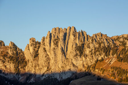 Sunrise and alpine glow Gastlosen mountains in Switzerland
