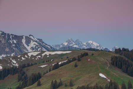 Sunrise over Friborg alps in Switzerland.