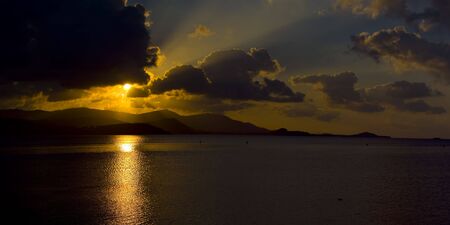 sunset at the big buddha beach on samui island in thailandの写真素材