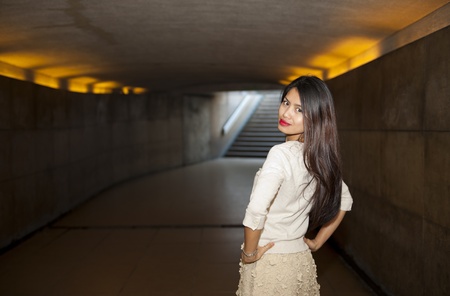 pretty woman posing in the subway area of parisの写真素材