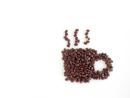 Coffee bean in coffee cup shape on white backgroundの写真素材