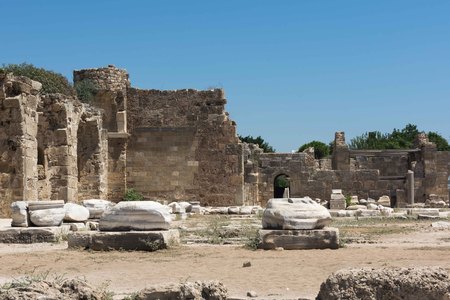 Ancient ruins in Side, Turkey. Beautiful ruins of a part of the temple of Appalon, against the blue sky.の写真素材