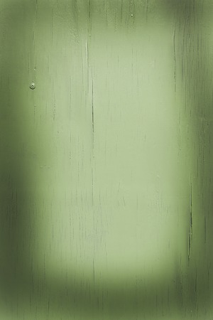 An old painted wooden wall, with cracks. Unusual background. Bの写真素材