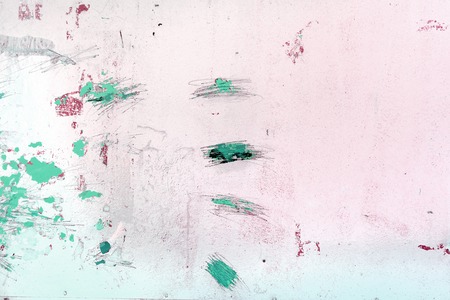 A wall with incomprehensible scratches, blots and divorcesの写真素材