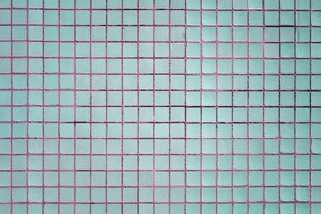 Wall of small squares. Blank background, texture of a ceramic mosaic.の写真素材
