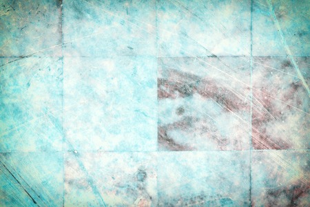 Wall with tiles of bright turquoise marble. Texture of old, scratched slabs close-up.の写真素材