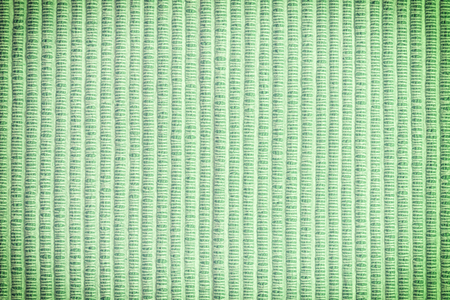 Texture of thick fabric close up. Empty green background.の写真素材