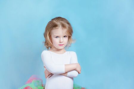 Caucasian Little Girl Ballerina in Colorful Tutu. Serious Blond Female Toddler Wearing Ballet Skirt...