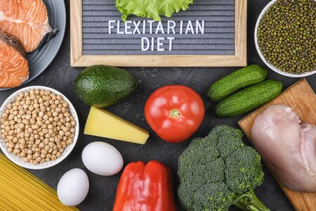 A set of products for a flexible diet. Felt plate with the inscription.