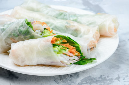 Spring rolls close up. A healthy dish with vegetables and shrimps.の写真素材